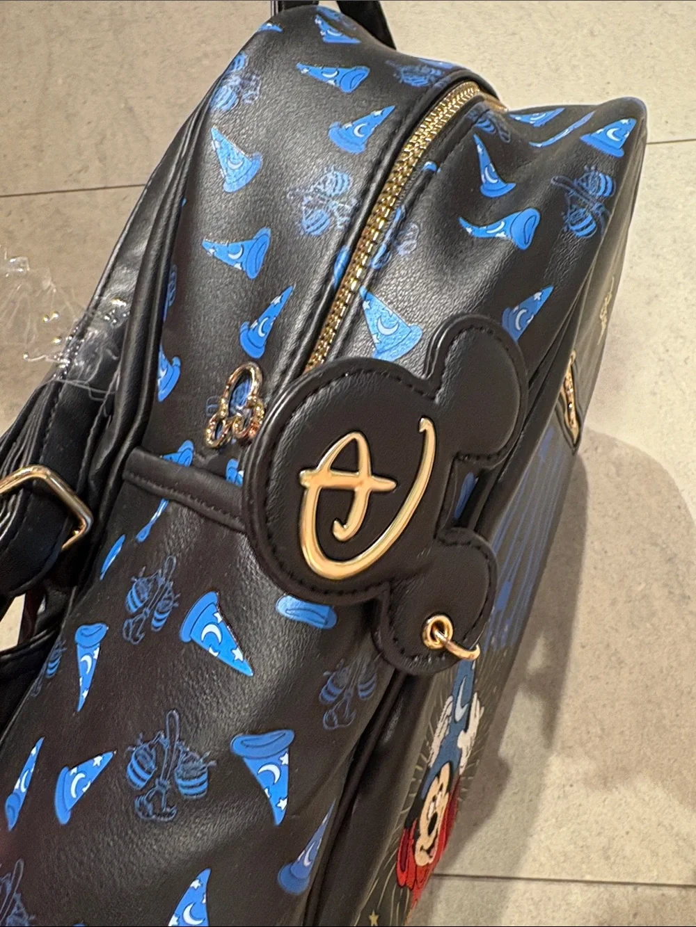 Disney Black Backpack with Bright Blue Fantasia Script & Gold Accents